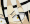 a blurred image of a person sitting at a desk with a pen and a piece of paper .