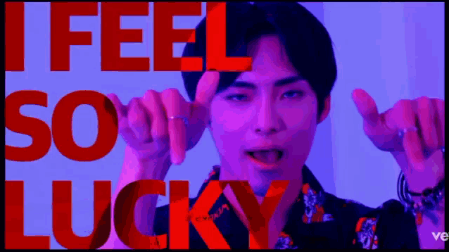 a man is making a funny face with the words " i feel so lucky " behind him