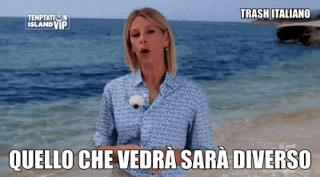 a woman standing on a beach with temptation island vip written on the top