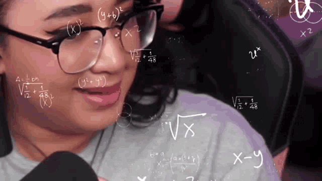 a woman wearing glasses is surrounded by mathematical equations on a chalkboard