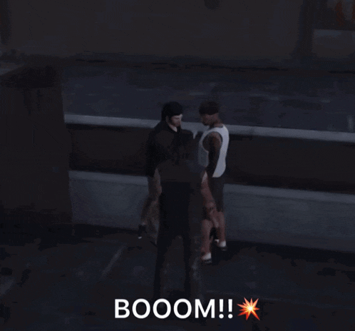 a group of people are standing in a dark room with the word boom on the bottom right