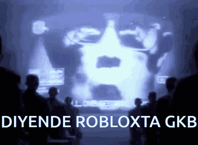a group of people looking at a screen that says diyende robloxta gkb on it