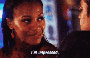 a woman says i 'm impressed in a blurry photo