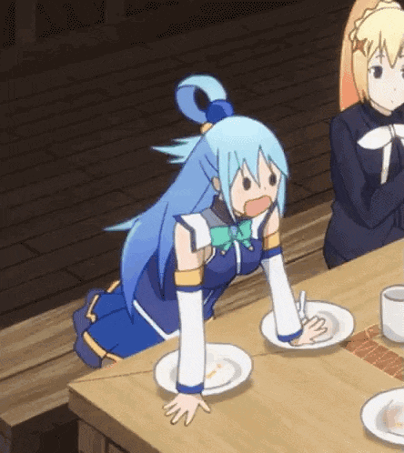 a girl with blue hair is kneeling down at a table with plates on it