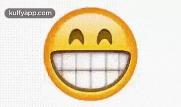 a close up of a smiley face with a big smile and white teeth .
