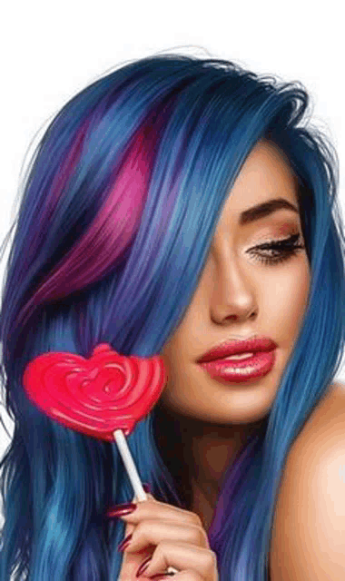 a woman with blue hair is holding a heart shaped lollipop in her hand .