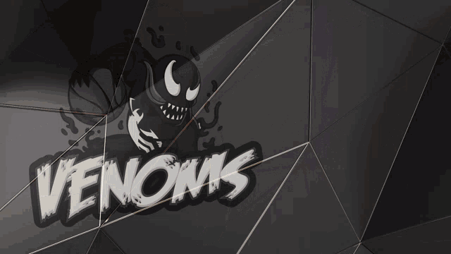 a man in a venom 's jersey stands in front of a venom 's logo