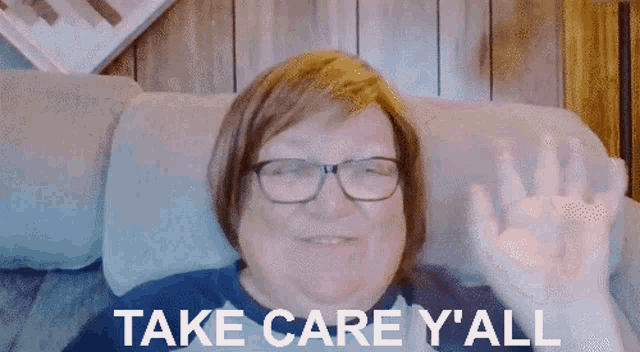 an elderly woman with glasses is sitting on a couch with the words take care y'all written on her face