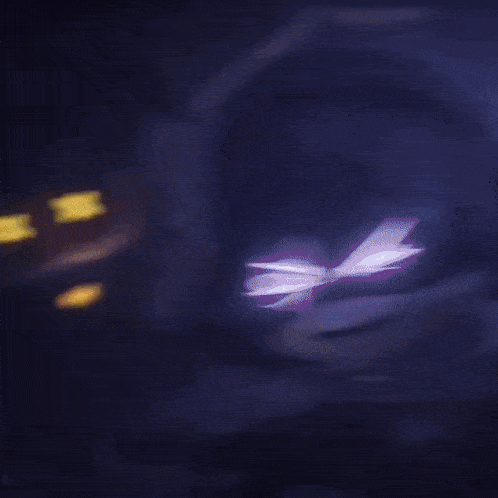 a pair of glowing x 's on a dark background