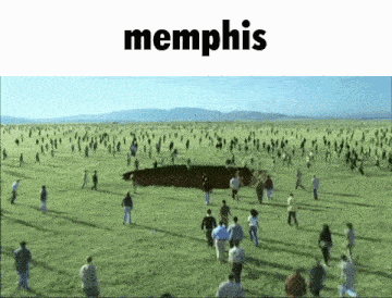 a large group of people are running in a field with the word memphis in the corner