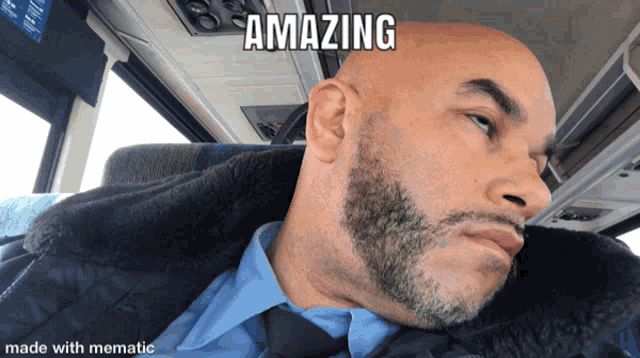 a man with a beard is sitting on a bus with the caption amazing made with mematic