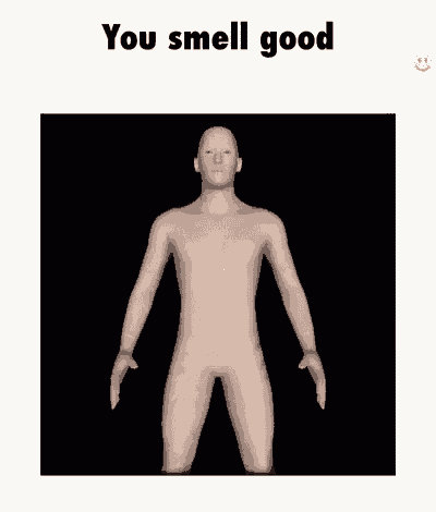 a naked man is standing in a box with his arms outstretched and the words `` you smell good '' .