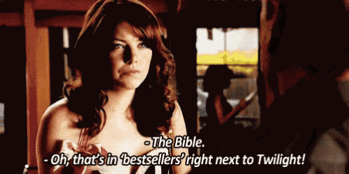 a woman is talking to a man and says " the bible oh that 's in bestsellers right next to twilight "