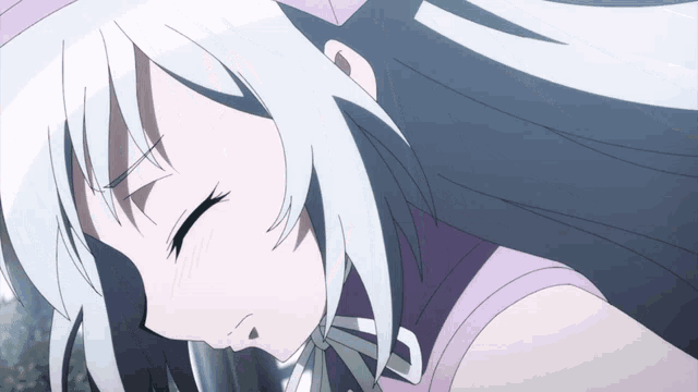 a girl with white hair and a purple top is sleeping