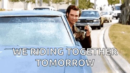 a man in a blue car is talking on a walkie talkie with the words we 're riding together tomorrow below him .