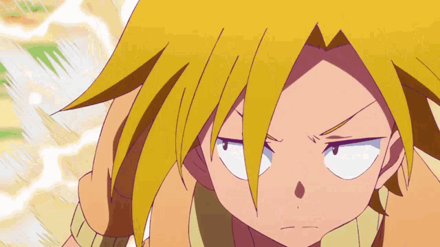 a close up of a cartoon character with yellow hair and a pink shirt