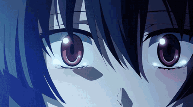 a close up of a person 's eyes with a glowing center