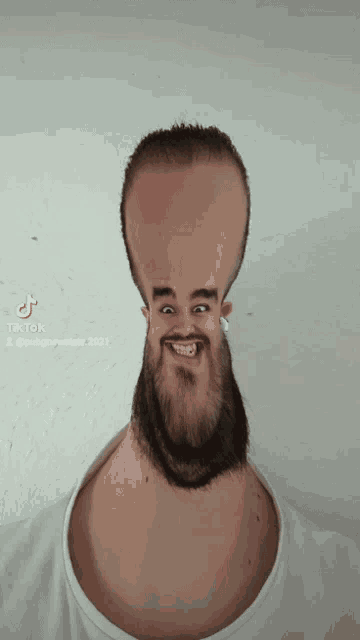 a man with a beard has a very long neck and a very big head