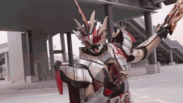 a person in a robot costume is holding a sword and shield