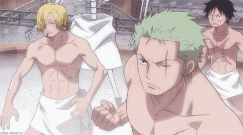 a group of anime characters are standing next to each other without shirts .