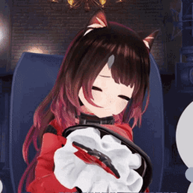 a girl with cat ears is sitting in a chair holding a red object