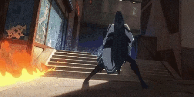 a person standing on a set of stairs with a shield