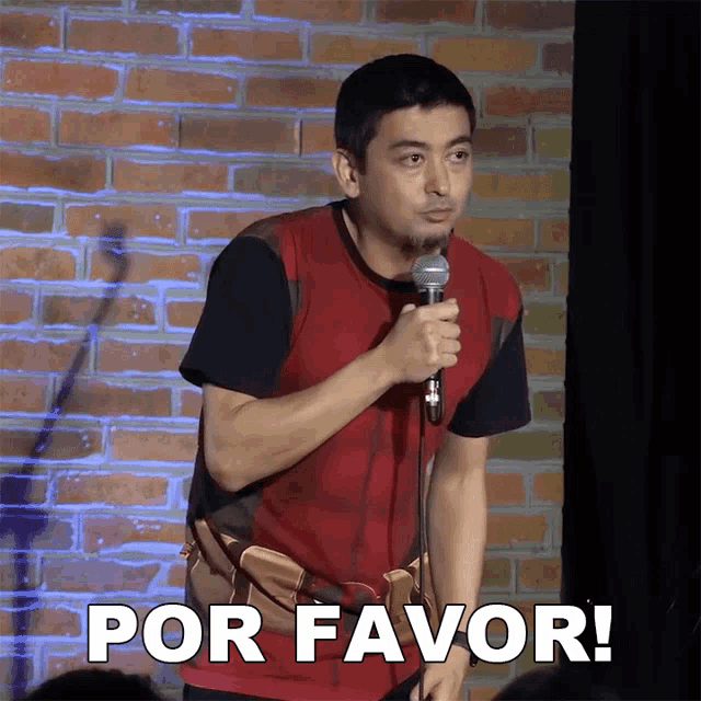 a man stands in front of a microphone with the words por favor on the bottom