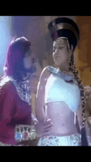 a man and a woman are standing next to each other .