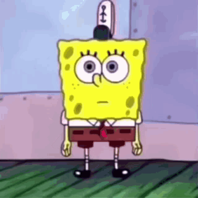 spongebob squarepants is standing on a wooden floor with a hat on his head .