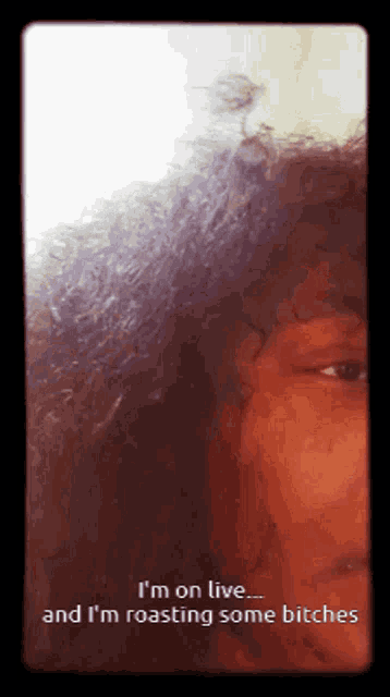 a picture of a woman with the words i 'm on live and i 'm roasting some bitches on the bottom