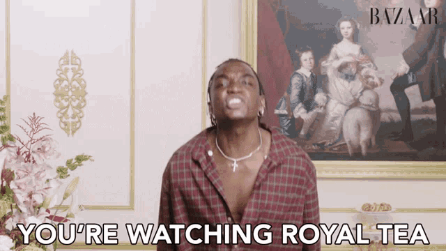 a man says you 're watching royal tea in front of a framed painting