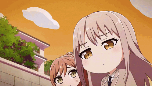 two anime girls are standing next to each other with one making a funny face