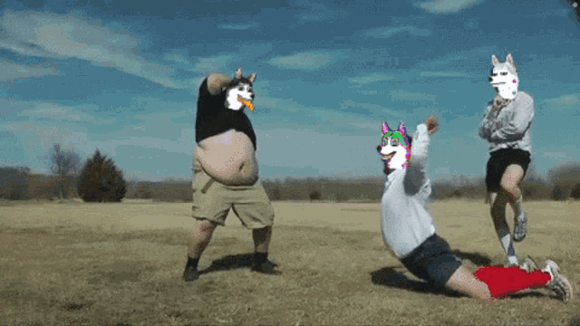 a man with a unicorn on his shirt is doing push ups