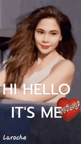 a woman says hi hello it 's me in front of a red heart