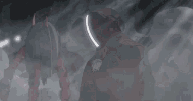 a cartoon character with a light coming out of his eyes