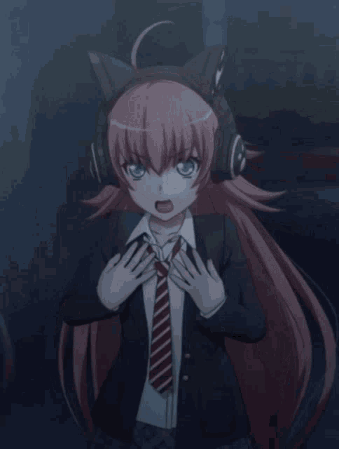 a girl in a suit and tie with headphones on her ears