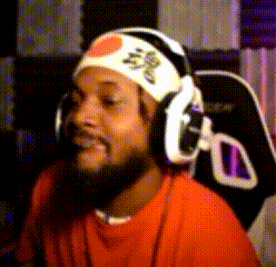 a man wearing headphones and a headband with a heart on it