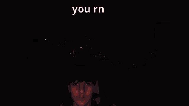 a person holding a cell phone with a smiley face on it and the words you rn on the bottom
