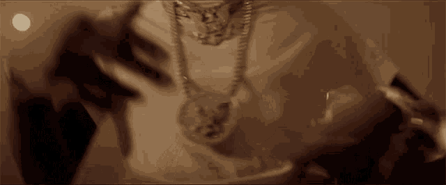 a close up of a person 's arm with a bracelet on