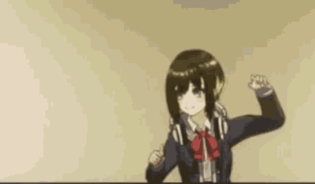 a girl in a school uniform is dancing with her hands in the air while wearing headphones .