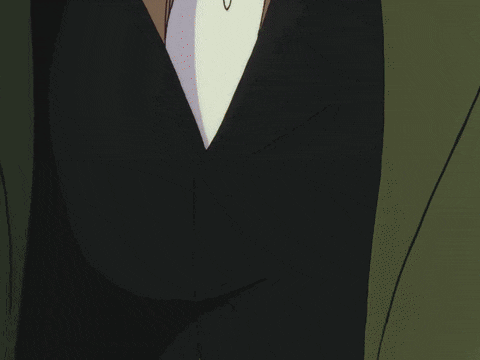 a close up of a man 's necktie and shirt