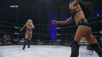 two women are wrestling in a ring with the words impact wrestling on the bottom right