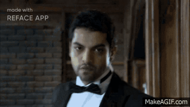 a man in a tuxedo and bow tie is being made with reface app