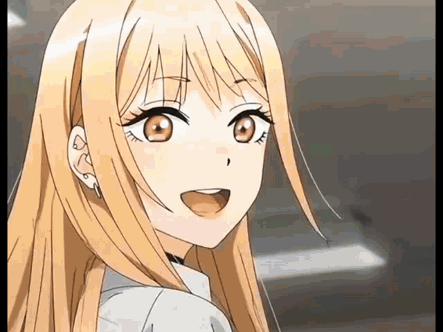 a close up of a blonde anime girl with red eyes and long blonde hair .