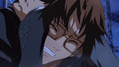 a man with glasses is being held by another person