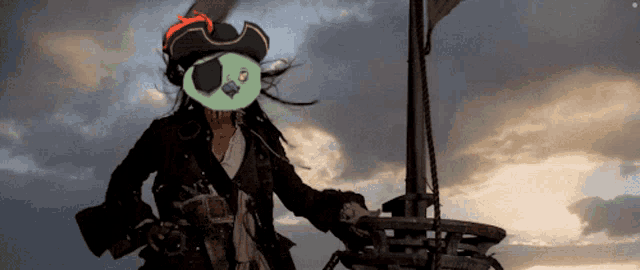 a pirate with a green mask on his face stands on a boat