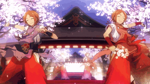 a couple of anime characters dancing in front of a building