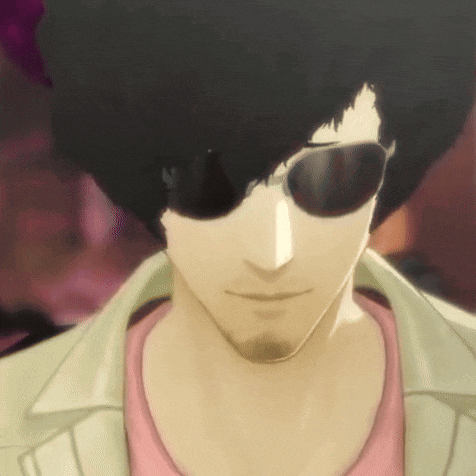 a close up of a man wearing sunglasses and a pink shirt