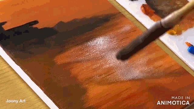 a painting is being painted with a brush and made in animatica