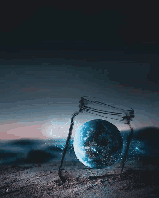 the earth is in a glass jar with a broken lid